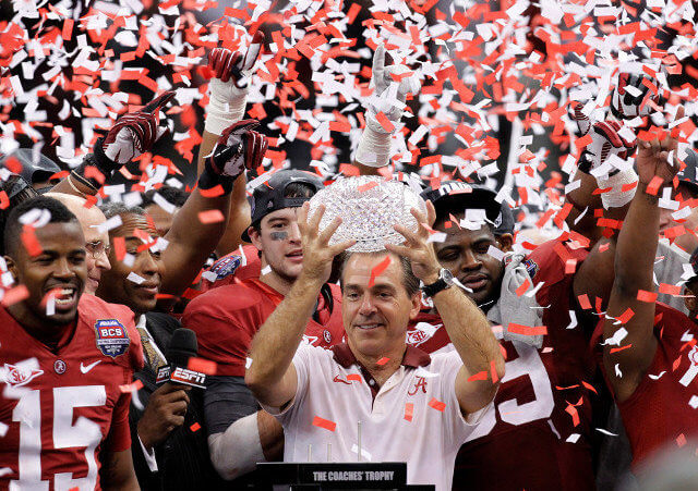 Alabama head coach Nick Saban celebrates with his team after the BCS National Championship college football game against LSU Monday, Jan. 9, 2012, in New Orleans (Credit: Gerald Herbert)