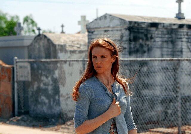 still from The Last Exorcism Part II of Ashley Bell as Nell Sweetzer walking through a cemetery (Credit: CBS Films)