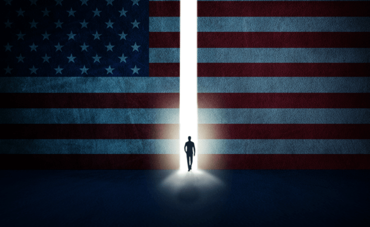 Man walking out from American flag wall. By ShadowPix/stock.adobe.com. Abdul Raziq is America's monster.