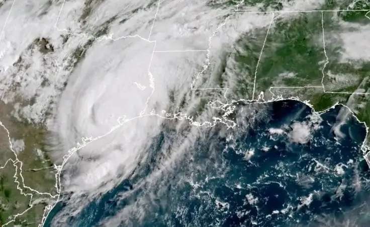 This GOES-16 GeoColor satellite image taken at 10:11 a.m. EDT on Monday, July 8, 2024, and provided by NOAA, shows Tropical Storm Beryl over Texas. Hurricane Beryl swept into Texas early Monday with heavy rains and powerful winds, knocking out power to 1.5 million homes and businesses and flooding streets with fast-rising waters as first responders raced to rescue stranded residents. (NOAA via AP)