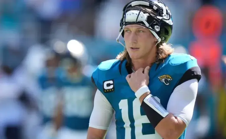 Jacksonville Jaguars quarterback Trevor Lawrence (16) takes a break during the second half of an NFL football game against the Miami Dolphins, Sunday, Sept. 8, 2024, in Miami Gardens, Fla. (AP Photo/Wilfredo Lee)