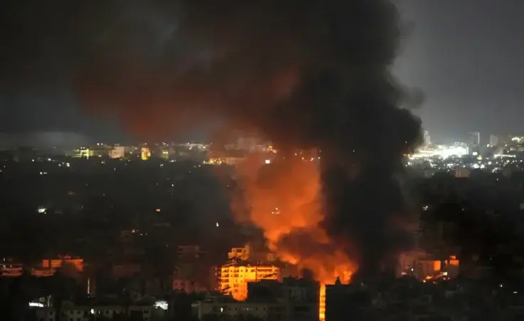 Flame and smoke rises from an Israeli airstrike on Dahiyeh, in the southern suburb of Beirut, Lebanon, early Sunday, Oct. 27, 2024. (AP Photo/Hussein Malla) Israel retaliation