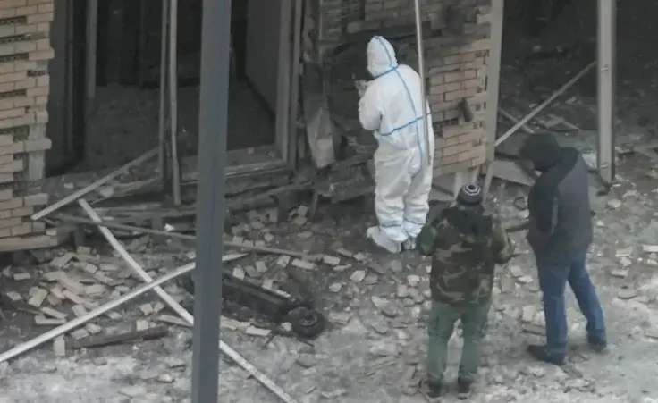 Investigators work near a scooter at the place where Lt. General Igor Kirillov, the head of Russia's Nuclear, Biological, and Chemical Defence Forces and his assistant Ilya Polikarpov were killed by an explosive device planted close to a residential apartment's block in Moscow, Russia, Tuesday, Dec. 17, 2024. (AP Photo)