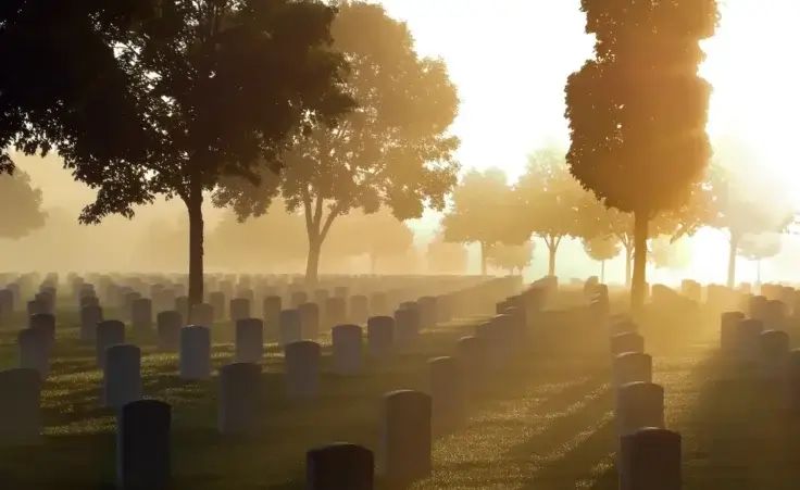 Cemetery in the fog to illustrate how God redeems death for an even greater good. By Karen Perhus/stock.adobe.com