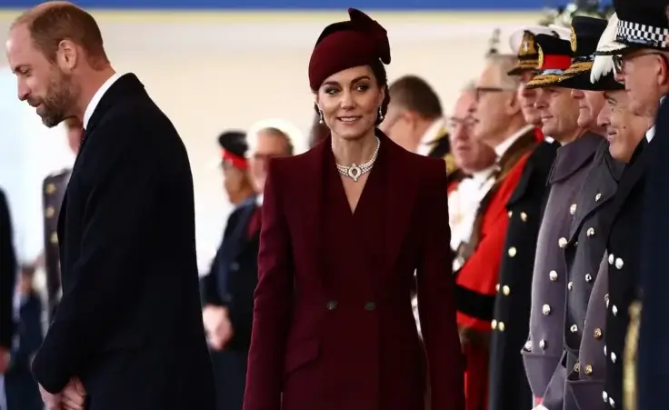 Britain's Catherine, Princess of Wales greets dignitaries as she arrives ahead of a Ceremonial Welcome for the Emir of Qatar at Horse Guards Parade in London, Tuesday Dec. 3, 2024. (Henry Nicholls via AP, Pool)