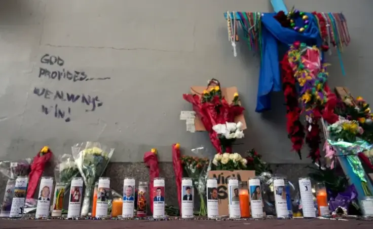 A memorial for the victims of a deadly truck attack on New Year's Day stands on the sidewalk in the French Quarter of New Orleans, Friday, Jan. 3, 2025. (AP Photo/George Walker IV) Attacker inspired by Islamic State, ISIS