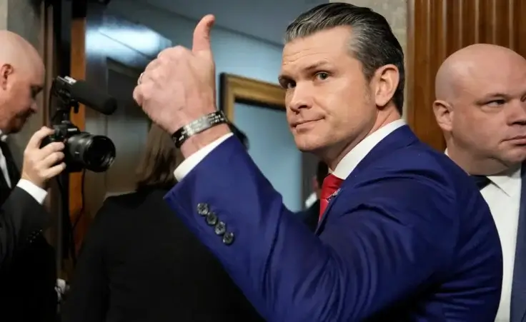 Pete Hegseth, President-elect Donald Trump's choice to be Defense secretary, gives a thumbs-up at the completion of his confirmation hearing before the Senate Armed Services Committee, at the Capitol in Washington, Tuesday, Jan. 14, 2025. (AP Photo/Ben Curtis)