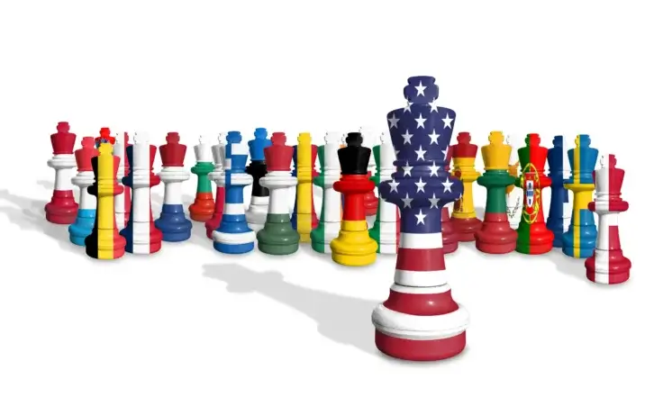 Chess figures of America and EU nations on a white background. By TomasRagina/stock.adobe.com. World Economic Forum