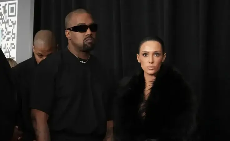 Kanye West, left, and Bianca Censori arrive at the 67th annual Grammy Awards on Sunday, Feb. 2, 2025, in Los Angeles. (Photo by Jordan Strauss/Invision/AP)