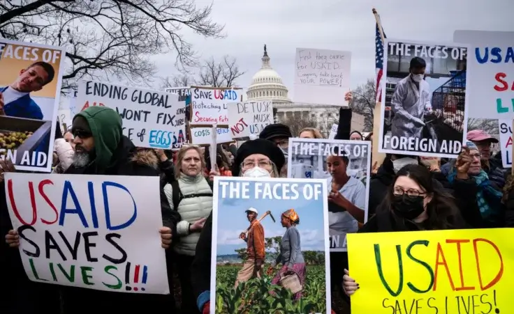 Demonstrators and lawmakers rally against President Donald Trump and his ally Elon Musk as they disrupt the federal government, including dismantling the U.S. Agency for International Development, which administers foreign aid approved by Congress, on Capitol Hill in Washington, Wednesday, Feb. 5, 2025. (AP Photo/J. Scott Applewhite)