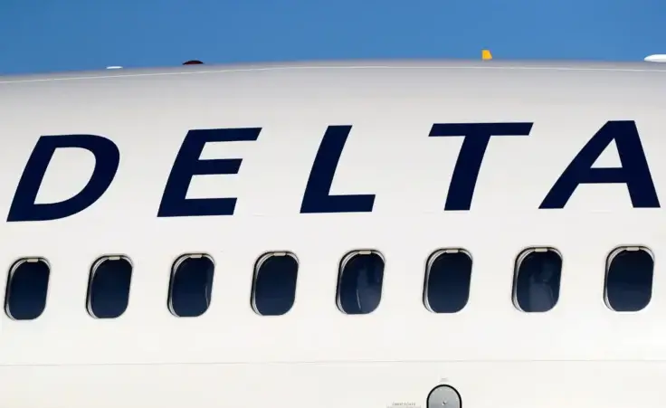 The company logo graces the side of a Delta Air Lines jetliner at Denver International Airport in Denver, on June 26, 2019. (AP Photo/David Zalubowski, File) Crash Delta