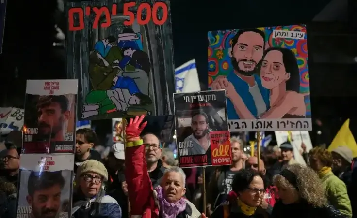 Relatives and supporters of Israelis held hostage by Hamas in Gaza gather for a rally marking 500 days of captivity and demanding their release in Jerusalem on Monday, Feb. 17, 2025. (AP Photo/Ohad Zwigenberg)