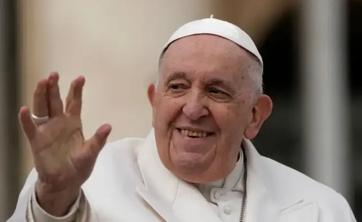 Pope Francis waves to faithful during his weekly general audience in St. Peter's Square, at the Vatican, Wednesday, March 29, 2023. Pope Francis went to a Rome hospital on Wednesday for some previously scheduled tests, slipping out of the Vatican after his general audience and before the busy start of Holy Week this Sunday. (AP Photo/Alessandra Tarantino)