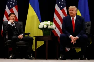 In this file photo taken on Wednesday, Sept. 25, 2019, U.S. President Donald Trump meets with Ukrainian President Volodymyr Zelenskiy at the InterContinental Barclay New York hotel during the United Nations General Assembly, in New York. (AP Photo/Evan Vucci, File)