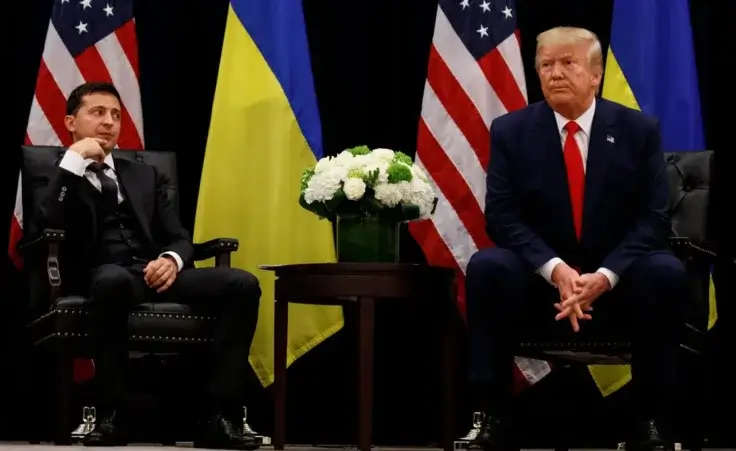 In this file photo taken on Wednesday, Sept. 25, 2019, U.S. President Donald Trump meets with Ukrainian President Volodymyr Zelenskiy at the InterContinental Barclay New York hotel during the United Nations General Assembly, in New York. (AP Photo/Evan Vucci, File)