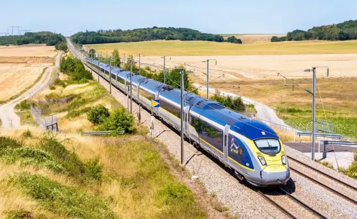 A Eurostar e320 high speed train is driving from Paris to London on the LGV Nord, the North European high speed railway line, in the french countryside. By olrat/stock.adobe.com