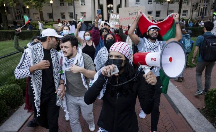 FILE - Palestinian supporters, including Mahmoud Khalil, second from left, demonstrate during a protest at Columbia University, Thursday, Oct. 12, 2023, in New York. (AP Photo/Yuki Iwamura, File)